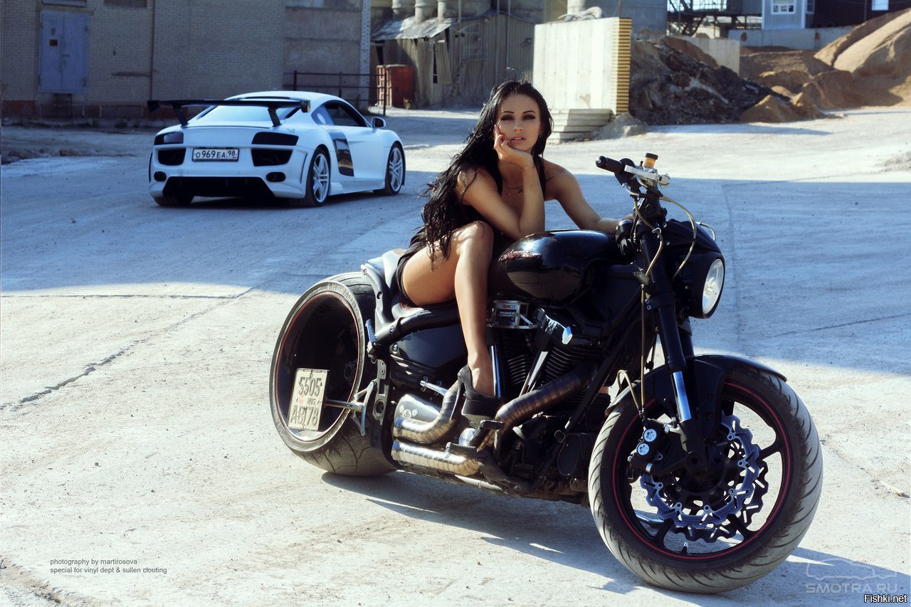 Sexy model Brunettes on a motorcycle in Kerbela